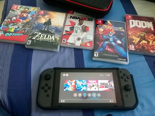Nintendo Switch with 5 Games.JPG